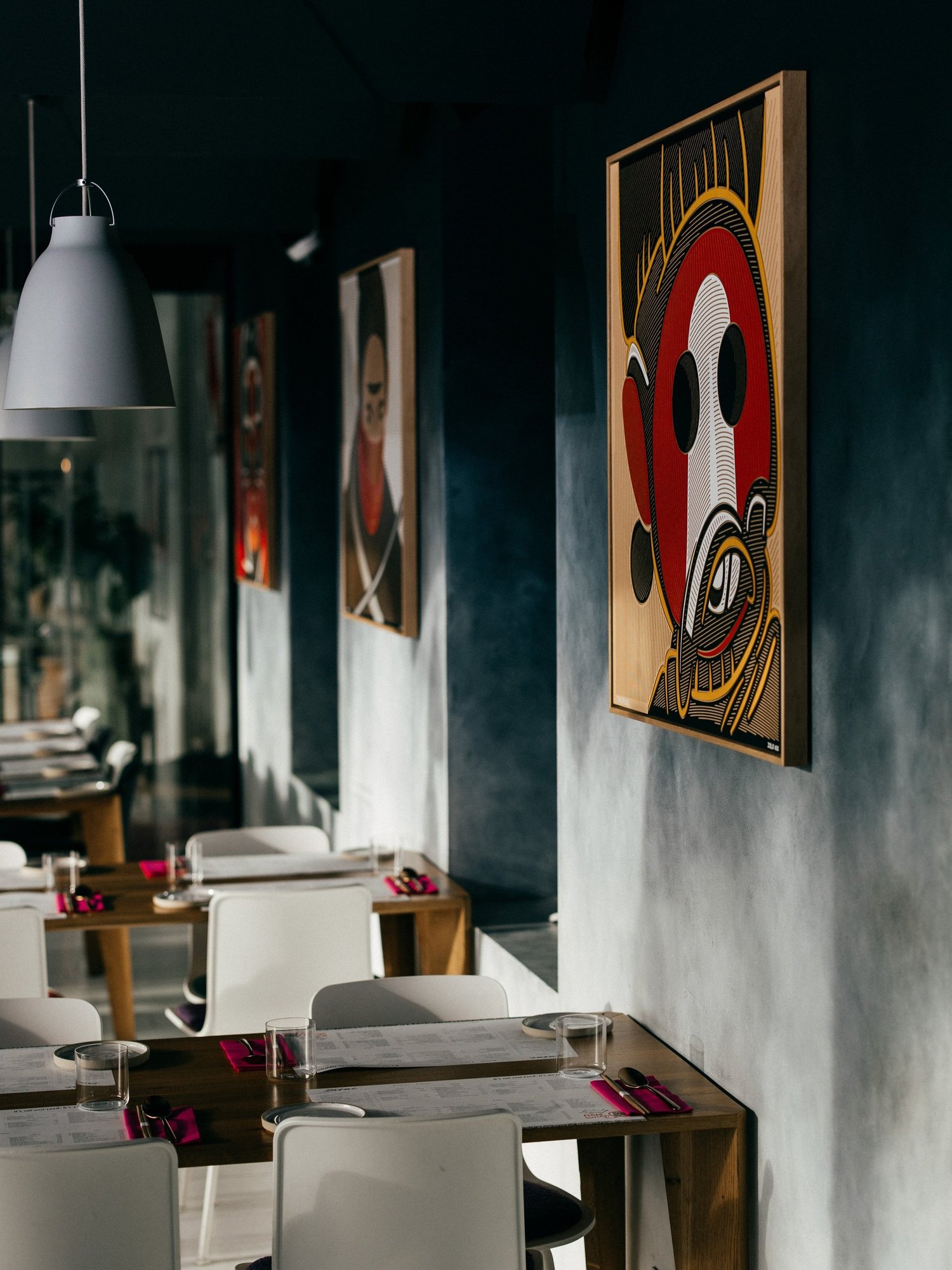 Paintings by Zolo Kis exhibited at Iasai Food Bar in Bratislava